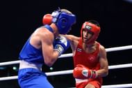 Atichai Phoemsap of Thailand in Red against Adrián of Hungary in Blue (Image Courtesy: AIBA)